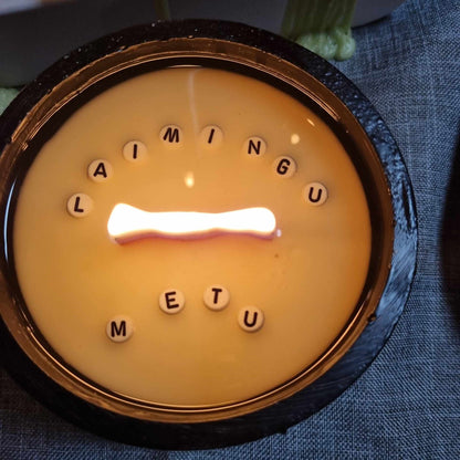 A candle with a hidden note