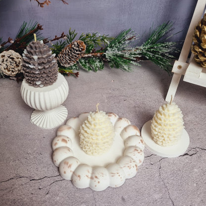 Pine cone candle