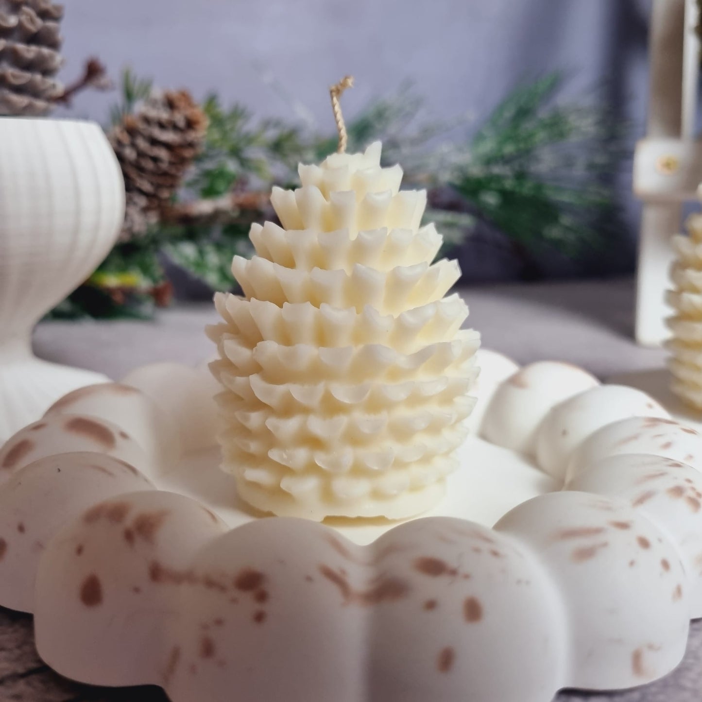 Pine cone candle