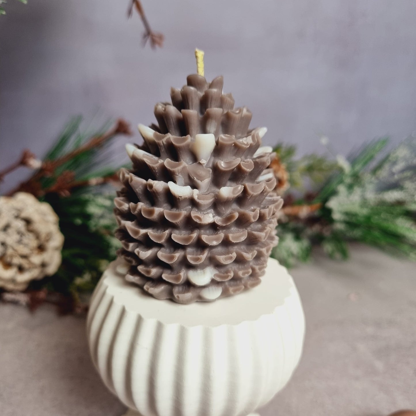 Pine cone candle