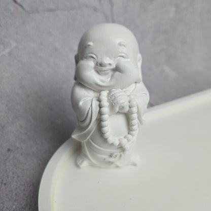 Besijuokiantis vienuolis