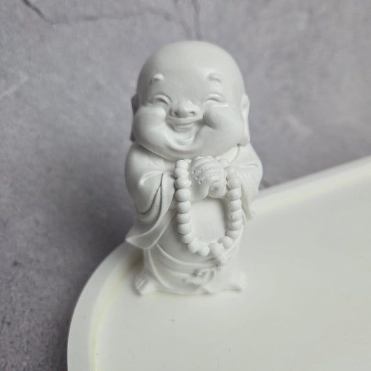 Besijuokiantis vienuolis